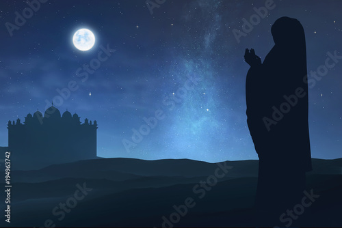 Silhouette of muslim woman raising hand and praying