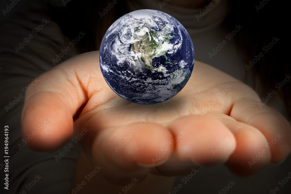 woman holding the planet earth in the hands. woman holding the planet earth in the hands.