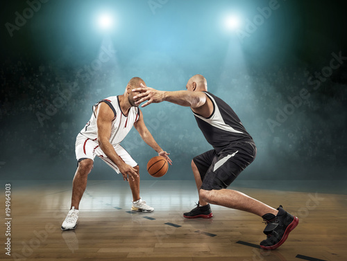 Caucassian Basketball Player in dynamic action with ball 
