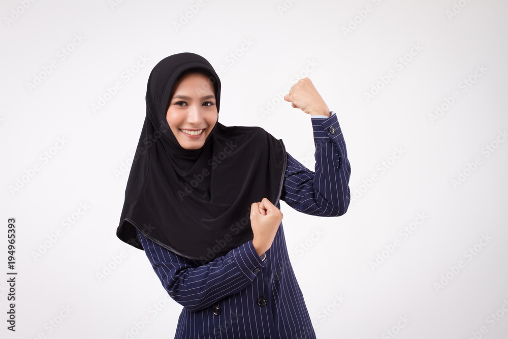 confident strong happy smiling successful muslim business woman; studio portrait of islamic business woman; asian businesswoman, female business person guts pose; asian girl adult woman model confident strong happy smiling successful muslim business woman; studio portrait of islamic business woman; asian businesswoman, female business person guts pose; asian girl adult woman model