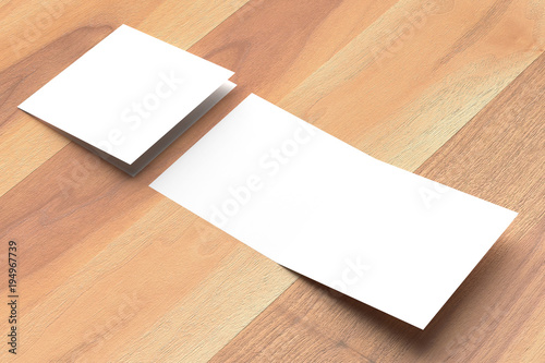Bifold square brochure mock up on wooden background. 3D illustrating.