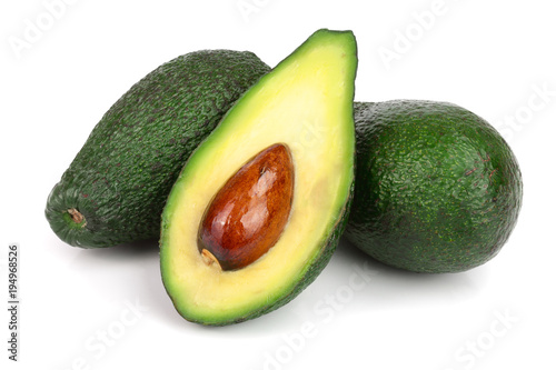 whole and half avocado isolated on white background close-up. Top view