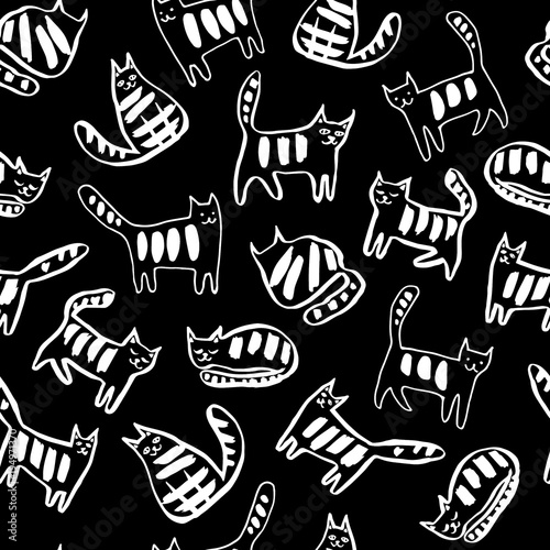 Seamless pattern with funny cats. Vector hand drawn illustration.