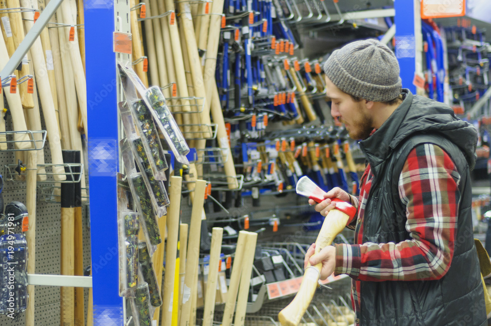 Man in a hardware store Man in a hardware store
