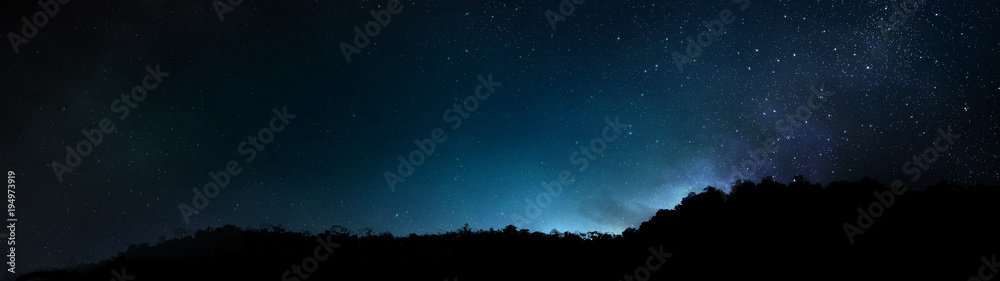 Mountain silhouette on Constellation Stars in the Universe Galaxy Background