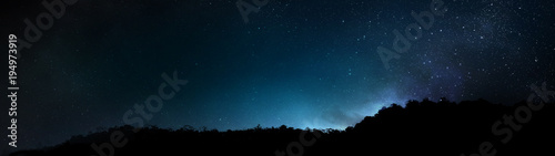 Mountain silhouette on Constellation Stars in the Universe Galaxy Background