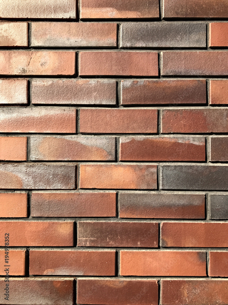Rusty texture of red brick wall. Detail and decoration. Rusty texture of red brick wall. Detail and decoration.