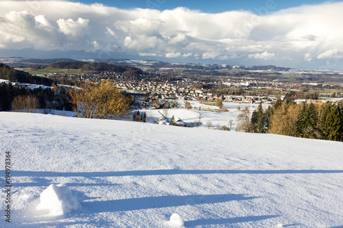 landscape of village in st. gallen in winter season, covered with snow, Switzerland photo