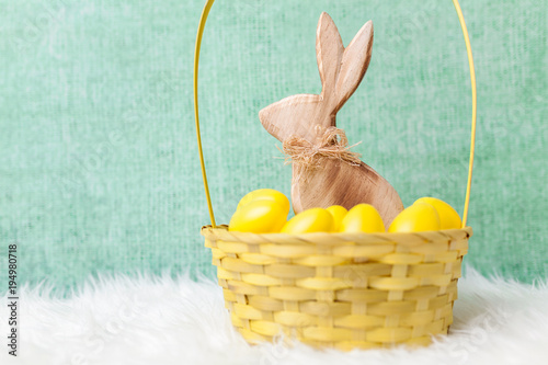 Easter holiday basket with a bunny and eggs