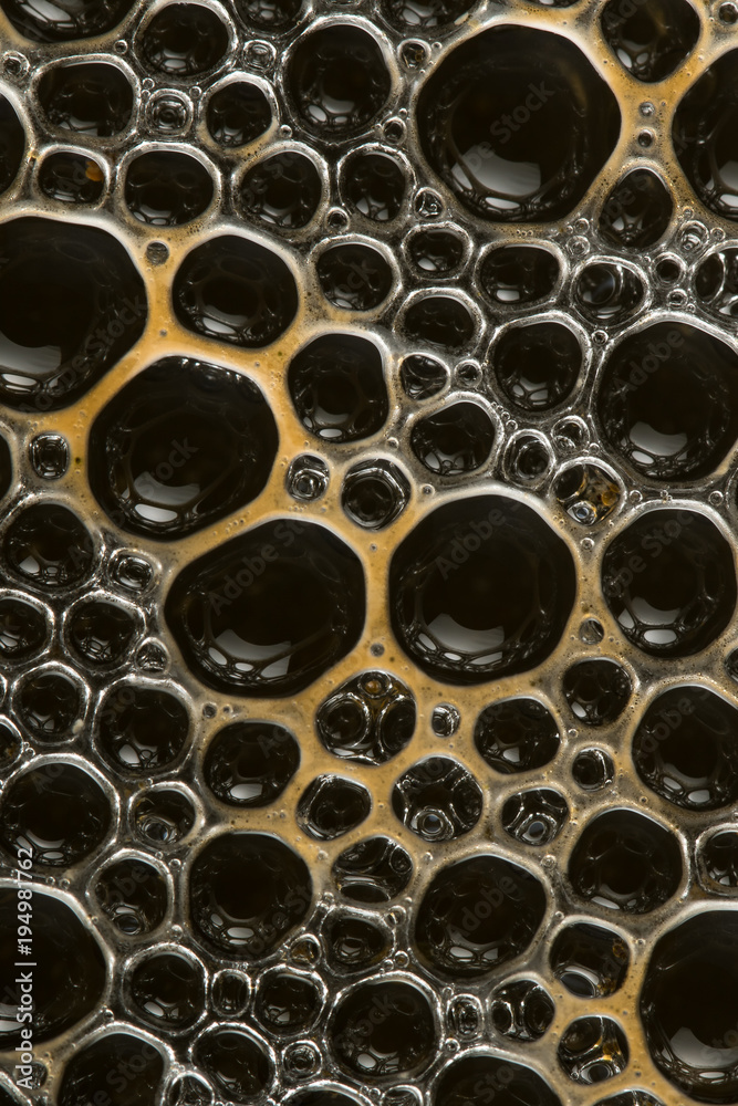 foam on dark liquid foam on dark liquid