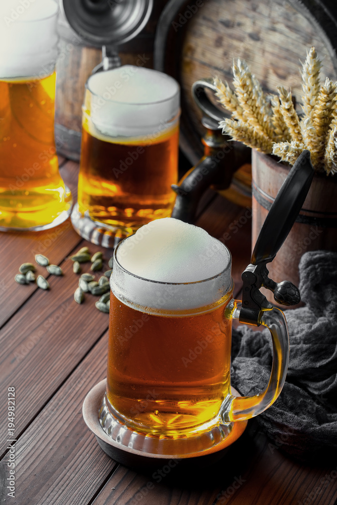 Light foam beer in a glass on an old background Light foam beer in a glass on an old background