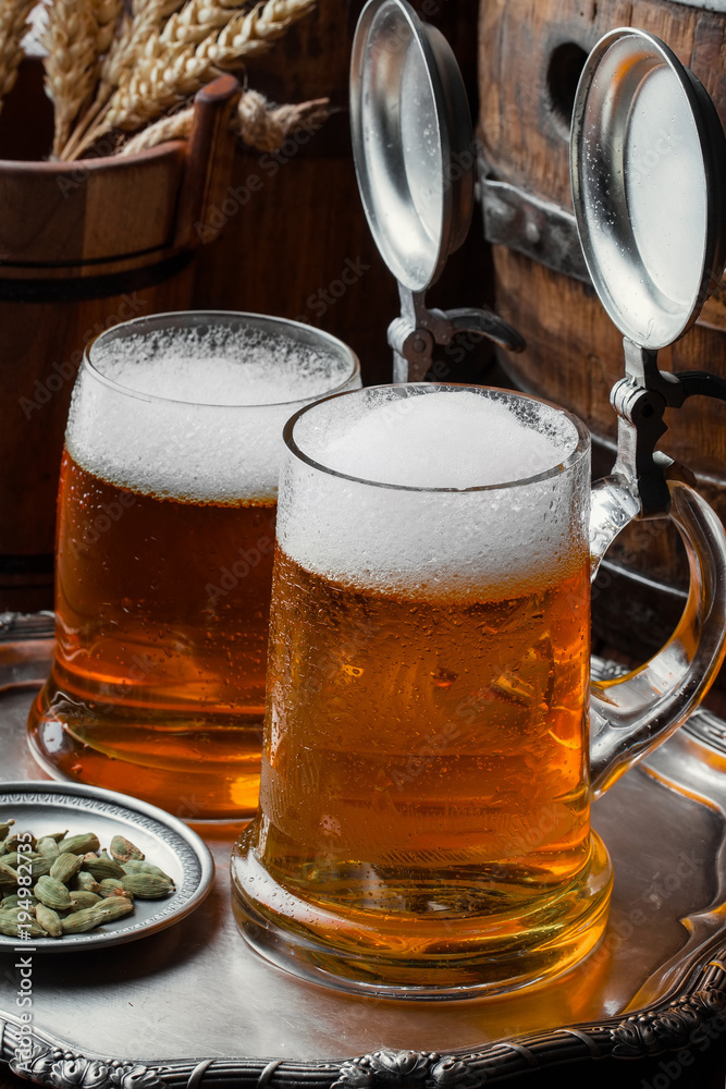 Light foam beer in a glass on an old background Light foam beer in a glass on an old background