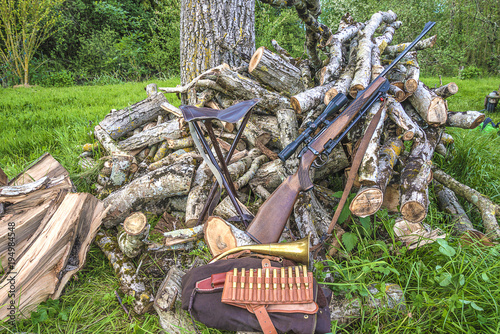 Beautiful hunting carbine and hunting equipment outdoors