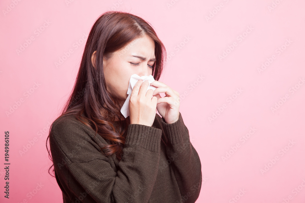 Young Asian woman got sick and flu.