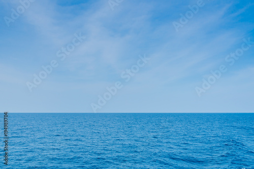 Beautiful sea Landscape with blue sky and tiny clouds on sunny day,Thailand.