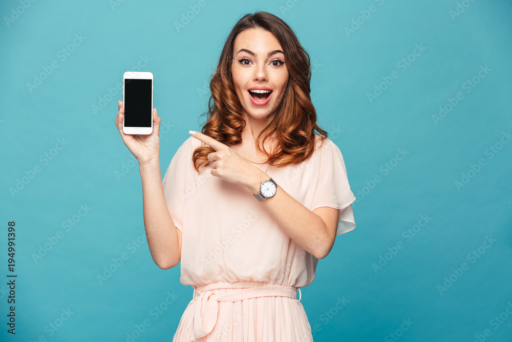 Portrait of an excited beautiful girl wearing dress - obrazy, fototapety, plakaty 