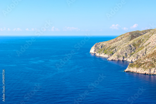 Fototapeta Naklejka Na Ścianę i Meble -  Blue sea and cliff in Porto Schiza on Zakynthos island. Greece.