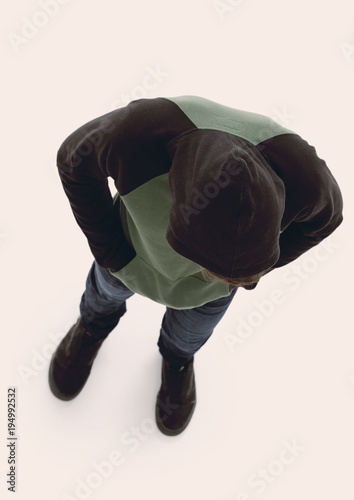 view from above. Hipster in a jacket with a hood looking down