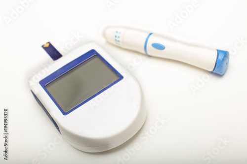 Portable glucose meter with blank monitor