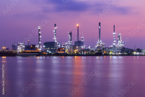 Oil refinery at the river in sunrise time / Big Factory in sunrise time © rukawajung