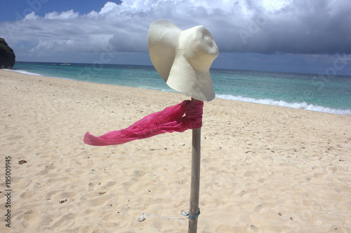 hat, scarf on the beach the island Borakay Filippiny photo