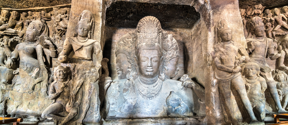 Trimurti Sadashiva sculpture in the cave 1 on Elephanta Island. Mumbai, India Trimurti Sadashiva sculpture in the cave 1 on Elephanta Island. Mumbai, India