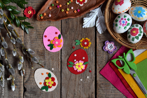 Making of handmade easter eggs from felt with your own hands. Children's DIY concept. Making Easter decoration or greeting card