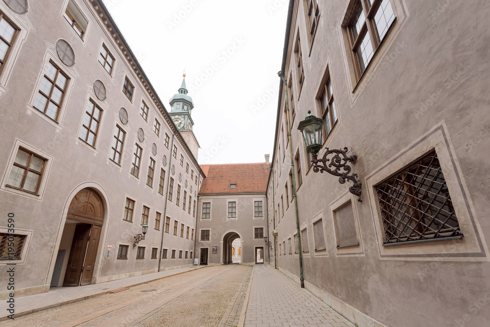 Empty street of historical city with old buildings and arches. Bavaria