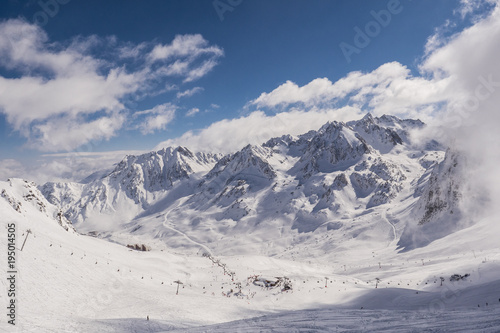 Winter mountains panorama with ski slopes, Bareges, Pyrennees, France