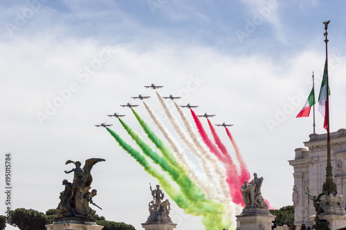 frecce tricolore in formazione in cielo per la festa della repubblica italiana photo