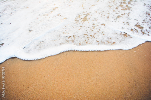 Canvas Print ocean wave on sandy beach