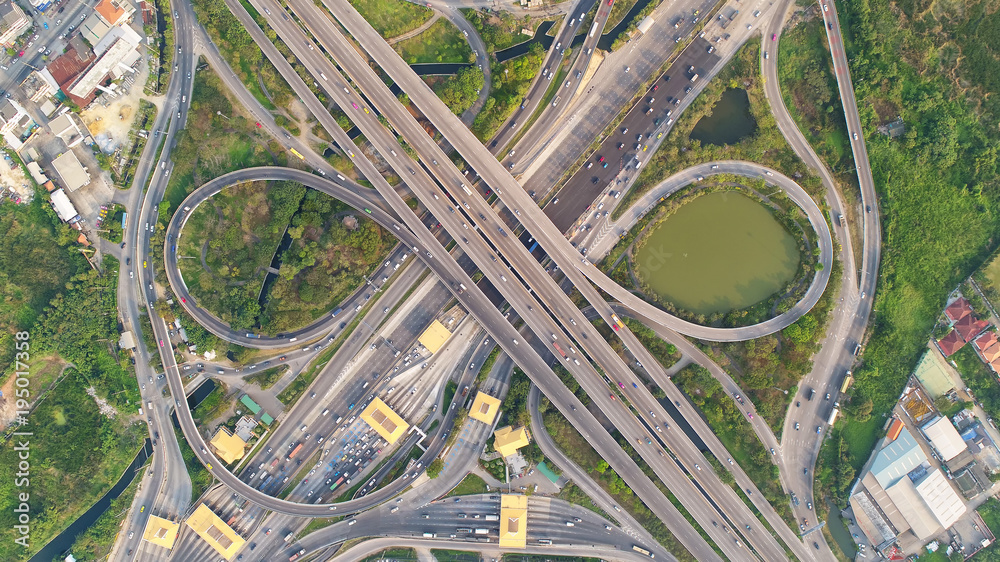 Top view city , Aerial view road , Expressway with car lots in the city in Thailand. Beautiful Street at downtown.