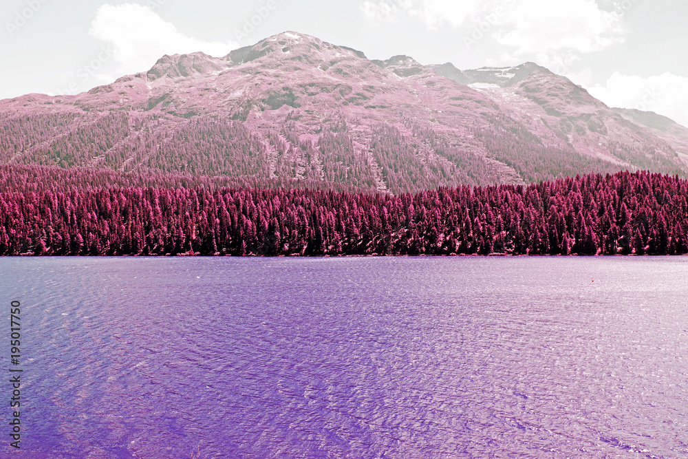 Ταπετσαρία A view of a lake, forest and mountains in the alps switzerland in color infrared
