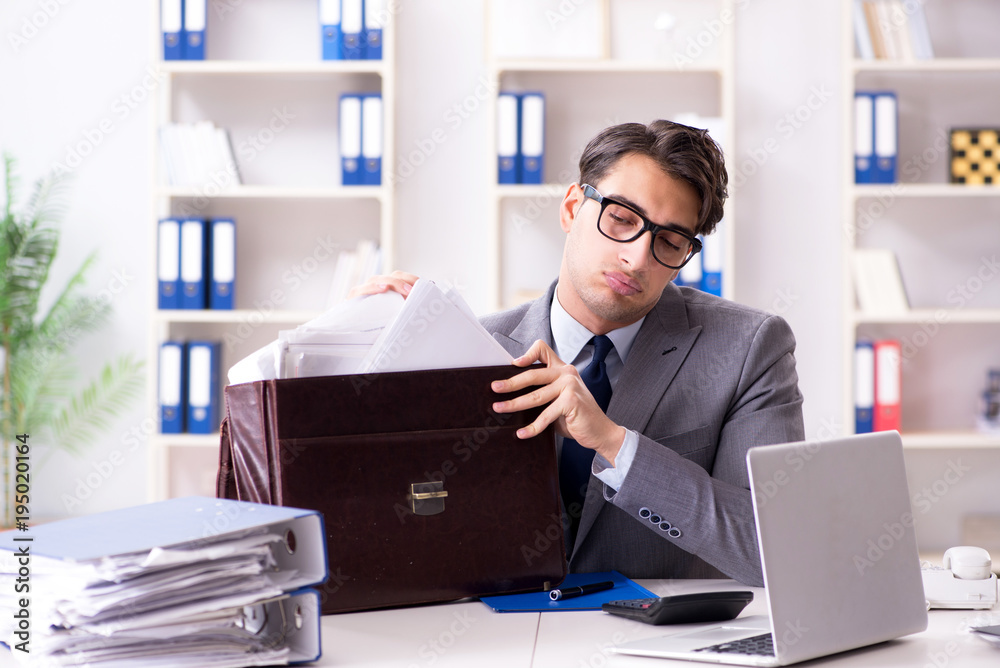 Employee with too much work taking it home Employee with too much work taking it home