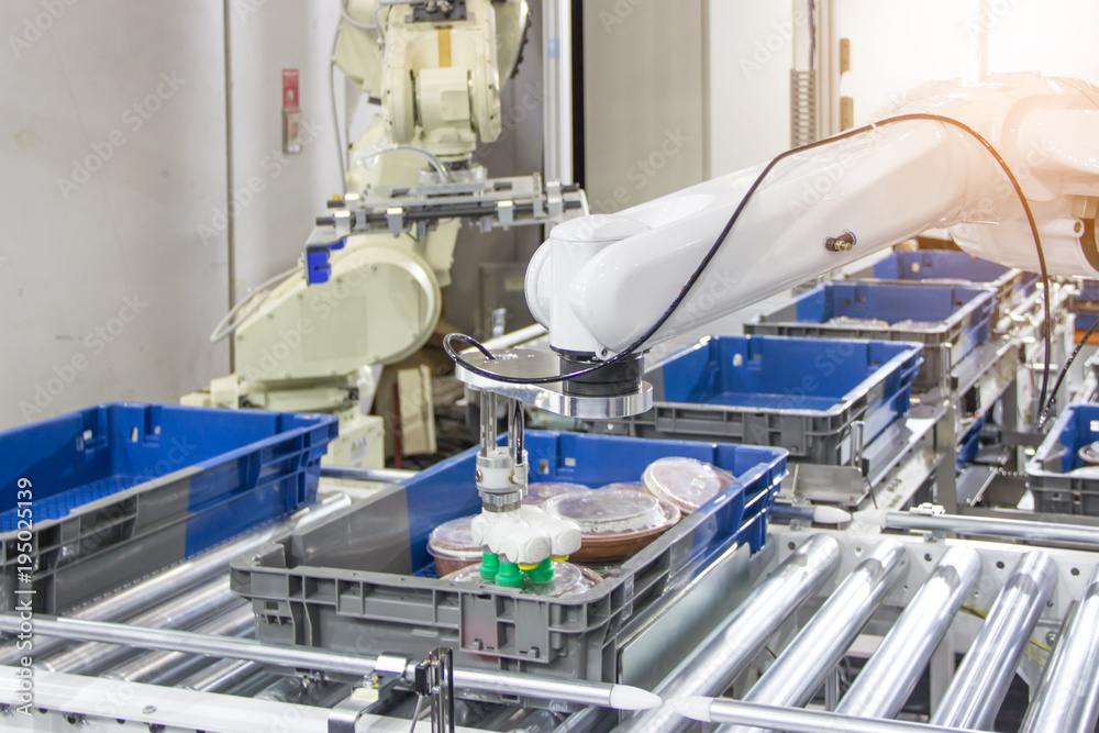 Industry 4.0 Robot concept .The robot arm is working smartly in the production department, the future factory. Industry 4.0 Robot concept .The robot arm is working smartly in the production department, the future factory.