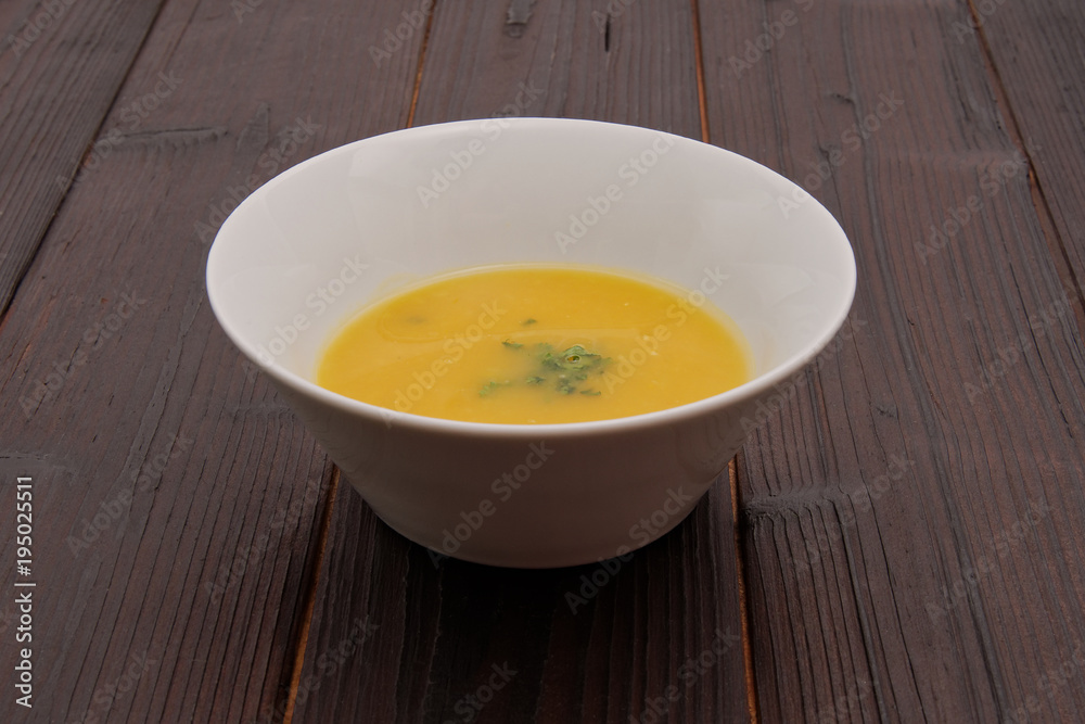 Pumpkin soup on a table Pumpkin soup on a table