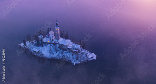 Aerial view of Bled lake in sunrise light photo