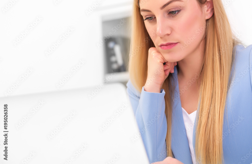 Business attractive woman working on laptop at workplace or at home. Business attractive woman working on laptop at workplace or at home.