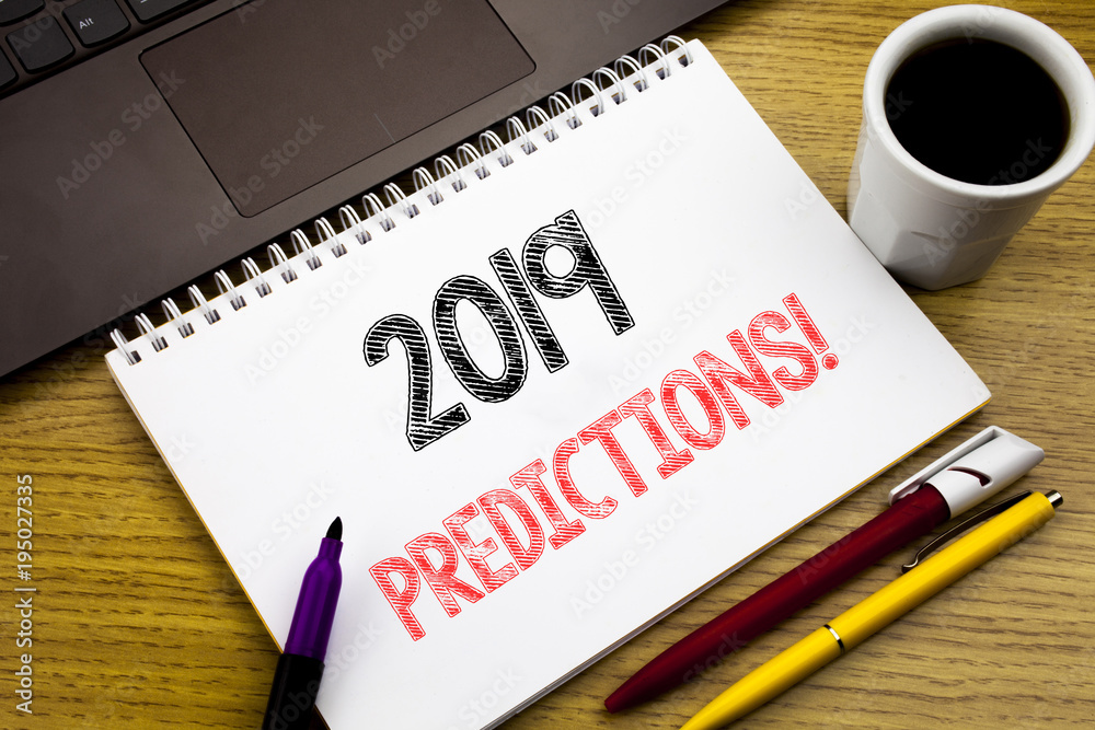 Writing text showing 2019 Predictions. Business concept for Forecast Predictive written on notebook book on the wooden background in the Office with laptop