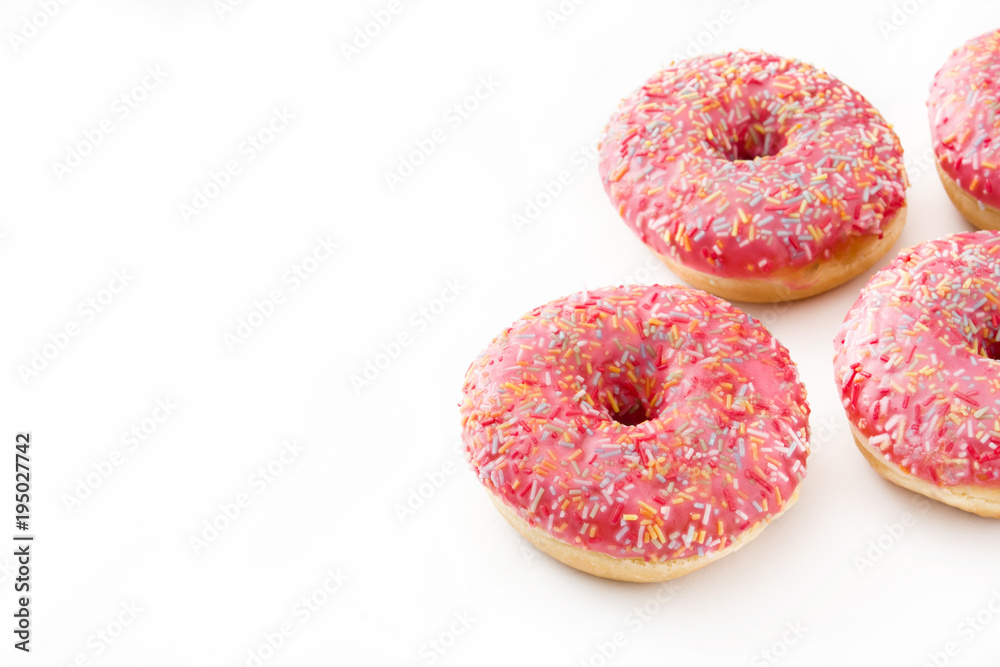 Pink frosted donut with colorful sprinkles. Isolated on white background
Pink frosted donut with colorful sprinkles. Isolated on white background