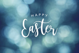 Happy Easter Calligraphy Text Over Blue Bokeh Lights Background