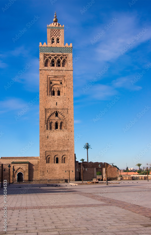 Great Koutoubia mosque in the background blue sky in Marrakesh, Morocco early morning