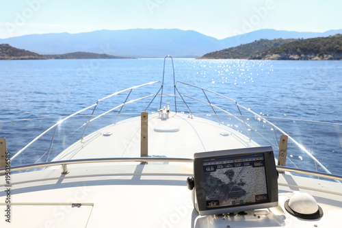 Summer day traveling by the yacht from Athens to Poros island, Greece. photo