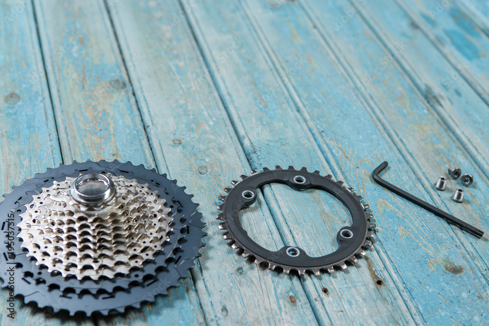 Fototapeta premium Bicycle parts on the table, beautiful bicycle texture
