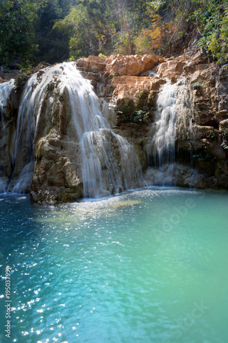 Close-up  beautiful green waterfalls. Copy space. © Rattana