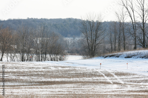 Winter Snowmobile Trail across farmland in the midwest.