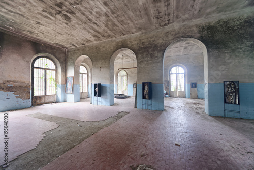 VOLTERRA, ITALY - FEBRUARY 24, 2018: Interior of abandoned asylum. It closed in 1984