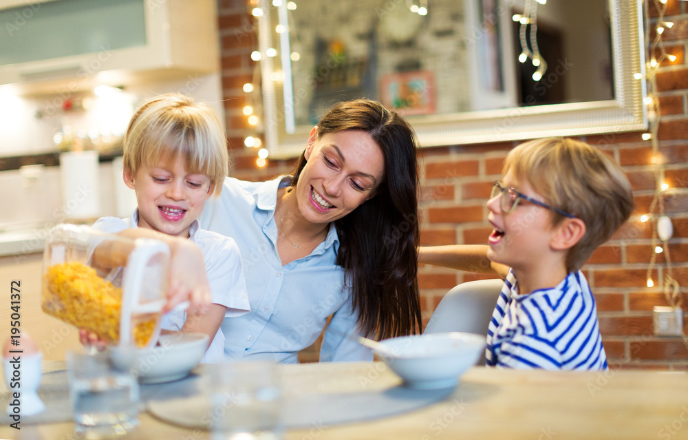 Mother and children at breakfast
Mother and children at breakfast