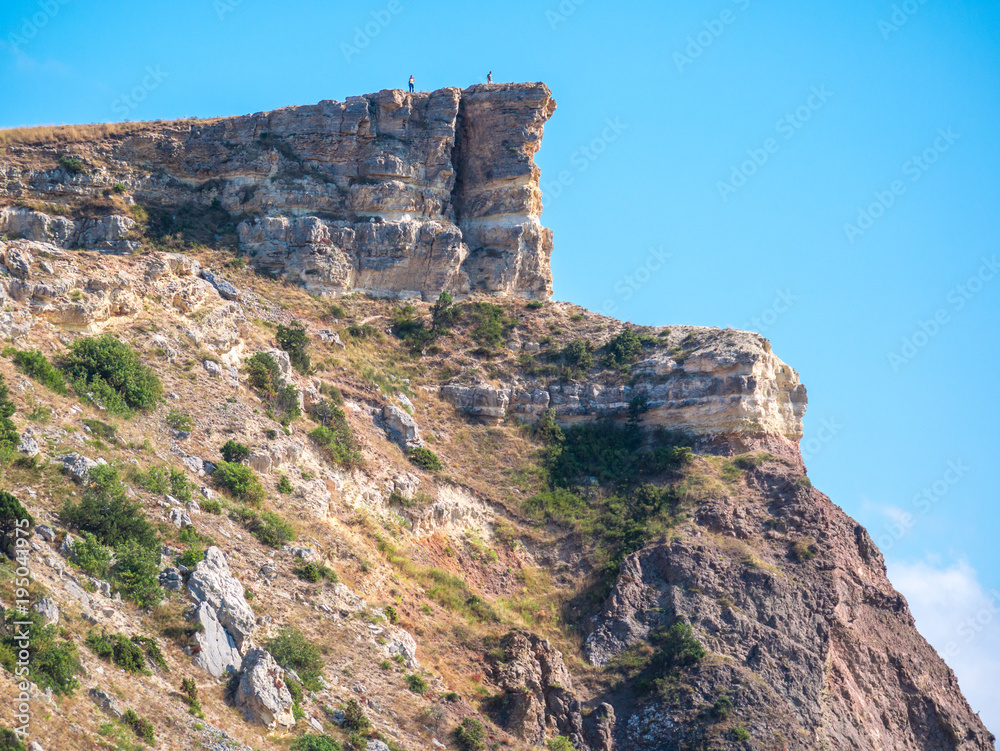 the mountainous landscape. view of the high steep cliff. Crimea the mountainous landscape. view of the high steep cliff. Crimea