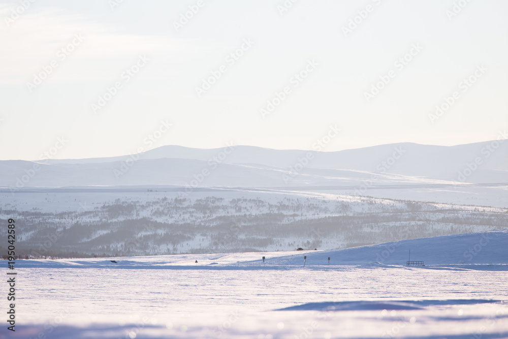 Beautiful minimalist landscape of winter in central Norway. Clear scenery in sunny day.